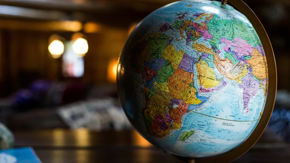 Photo of a globe in a library