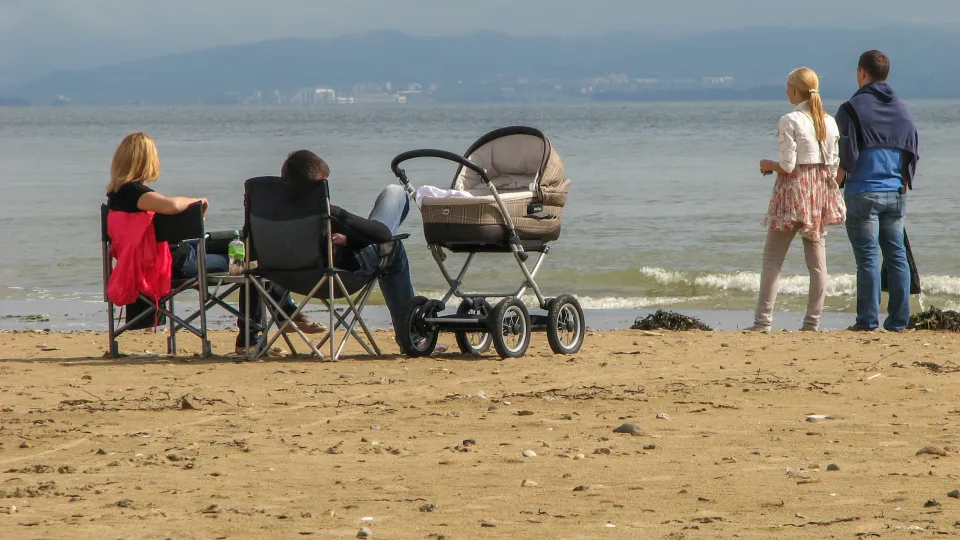 Photo of a beach with people