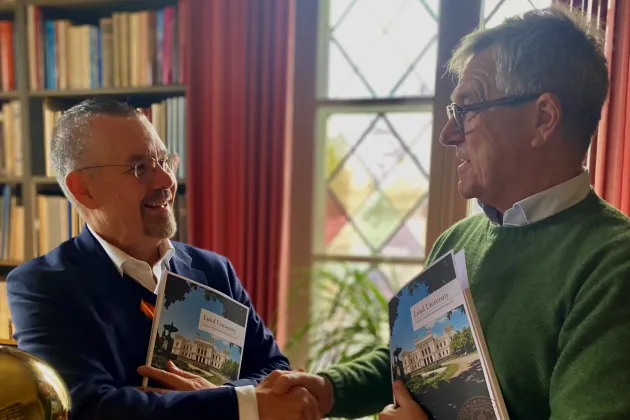 two men shaking hands