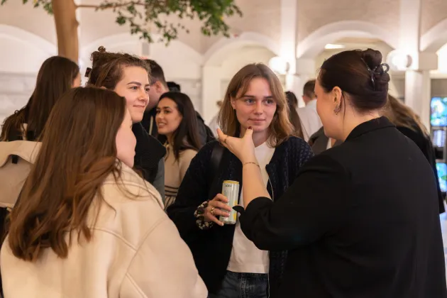 Four students talking 