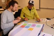 Two people in a workshop